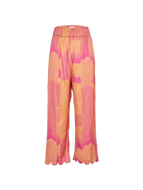 SIFNOS - Pantalon ample taille haute élastiquée bas finition pétales en satin de viscose imprimé Tie & Dye Fuchsia Pantalon Fête Impériale